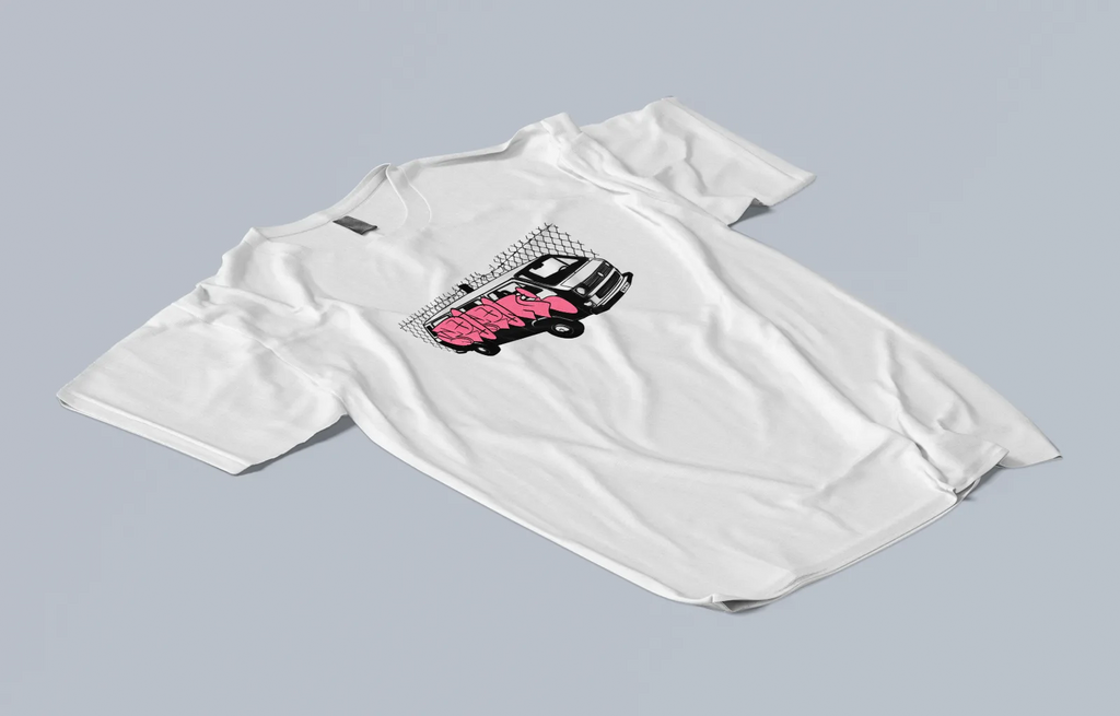 Pink Van Tee laid flat at an angle, van graphic on the chest